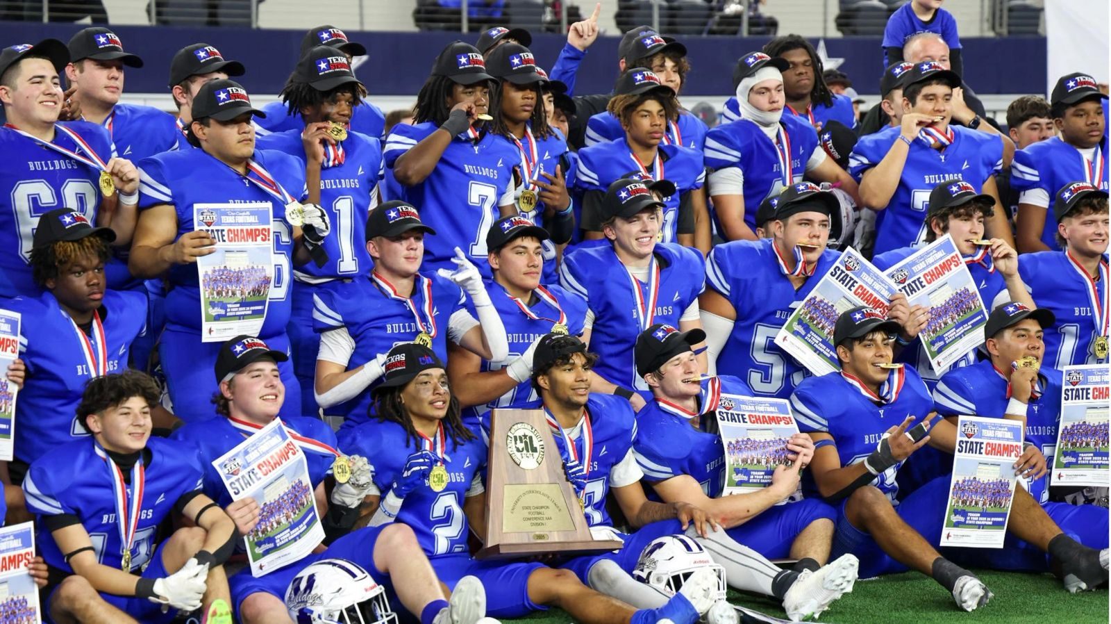 Yoakum Bulldogs celebrating the 2025 Texas state championship