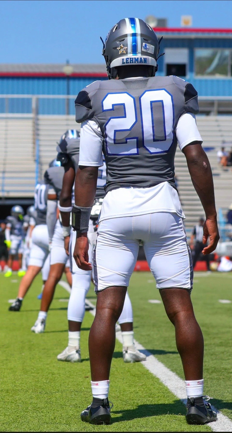 Player number 20 from behind, DigiWrist receiver on the forearm