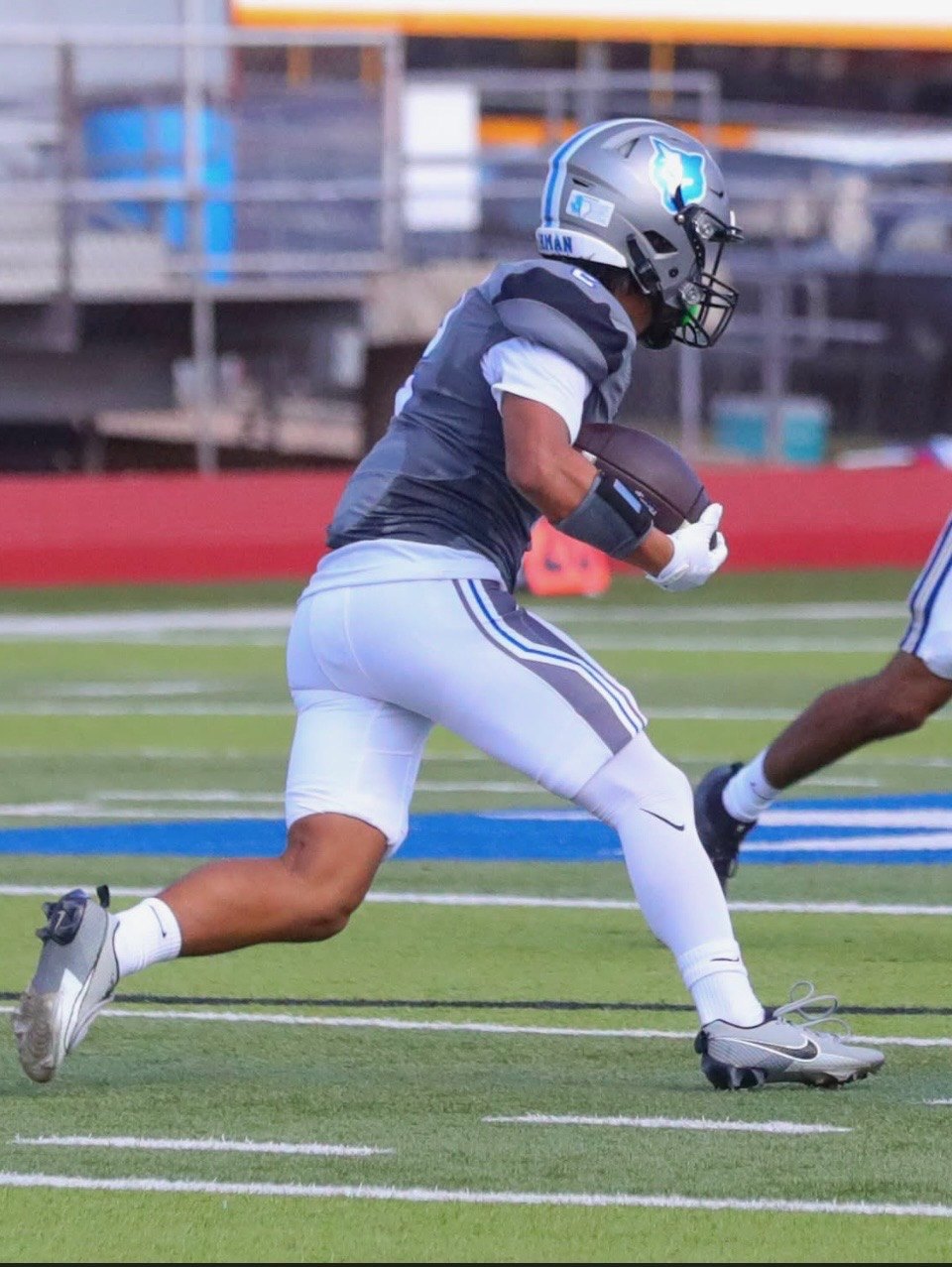 Running back carrying the ball